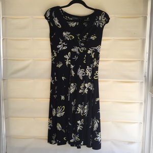 Mid length floral dress.